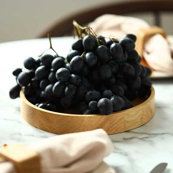 Coupe à fruits en chêne massif Le Beau Marius garnie de raisin